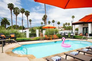 Outdoor pool, open 9:00 AM to 9:00 PM, sun loungers