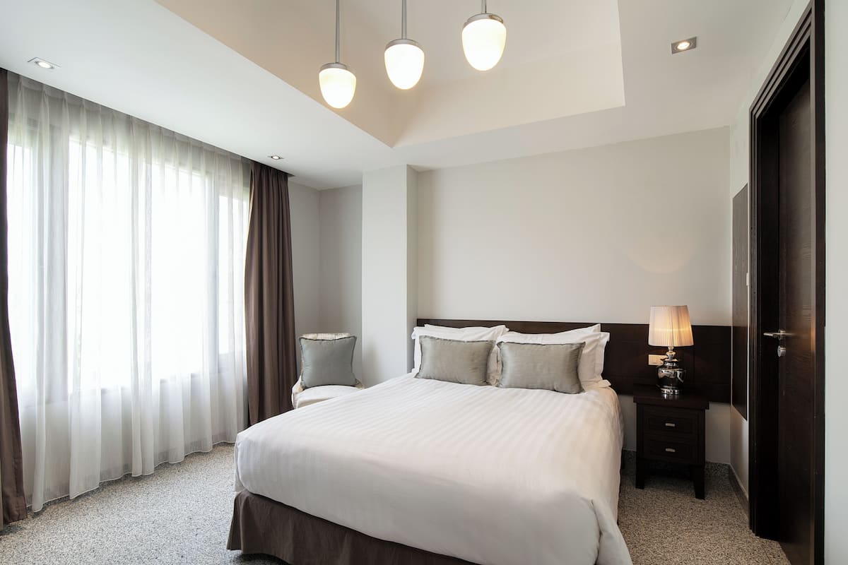 Suite, 1 slaapkamer | 1 slaapkamer, een kluis op de kamer, een bureau
