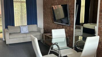 Family Room | Iron/ironing board, bed sheets