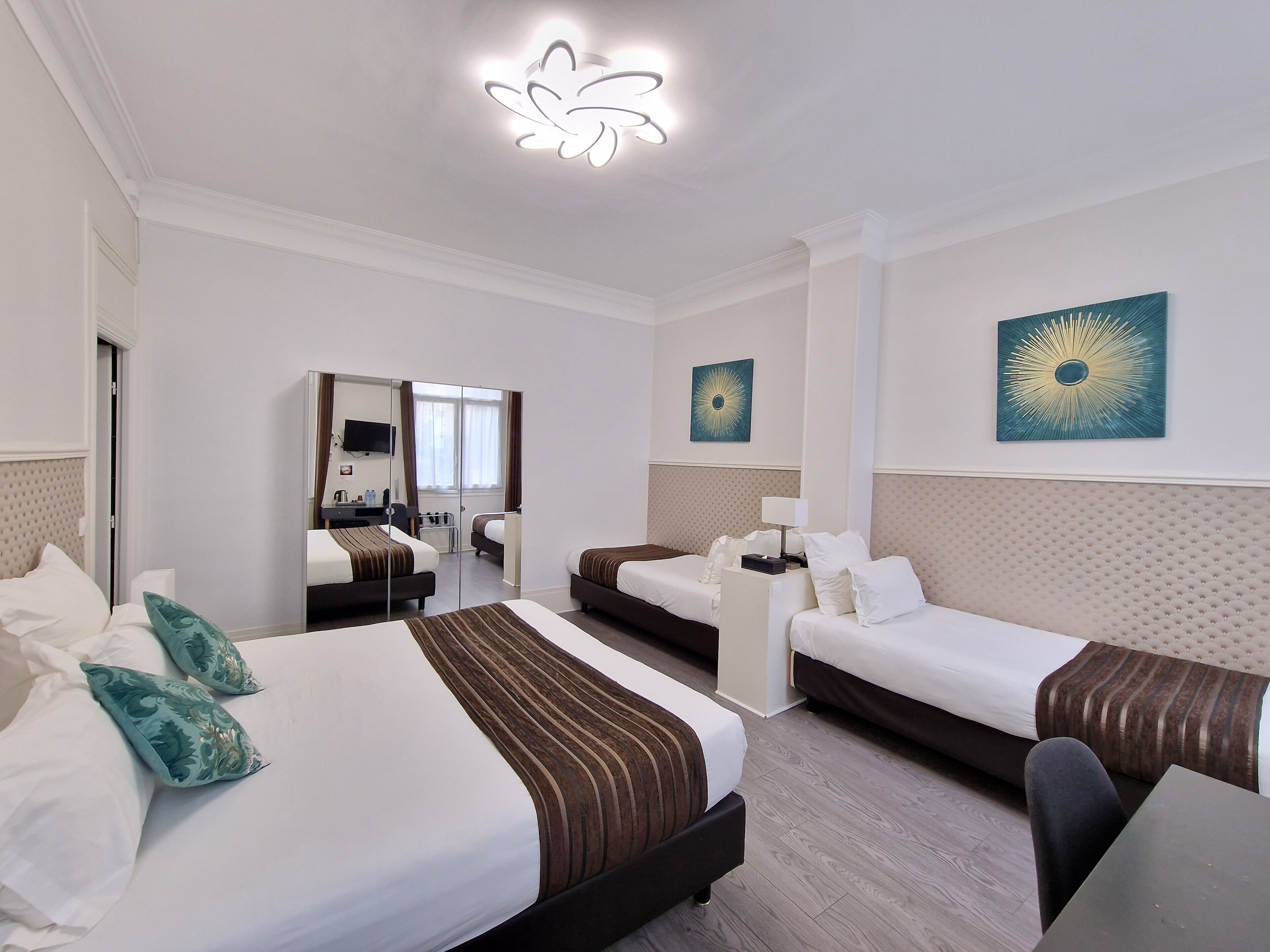 family room | in-room safe, desk, blackout curtains, soundproofing