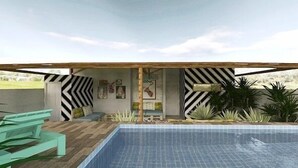 A modern outdoor pool area with a wooden deck, black and white striped walls, and various plants. - Vivaz Boutique Hotel (Recife)