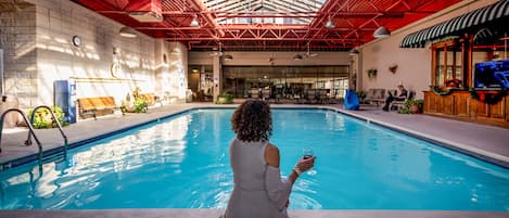 A heated pool, sun loungers