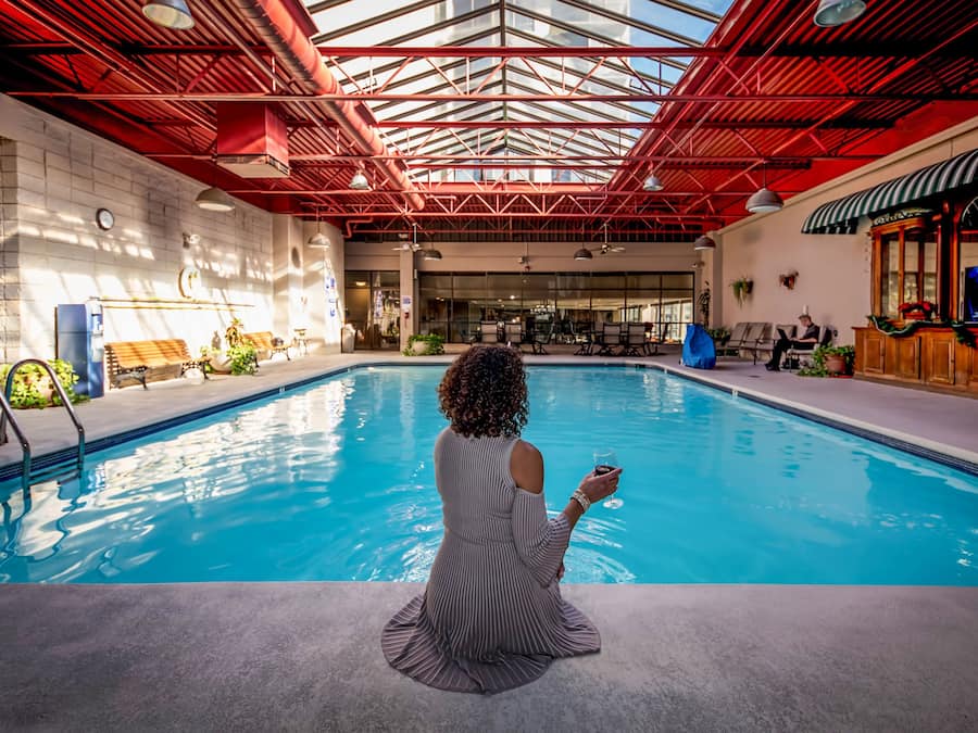 A heated pool, sun loungers