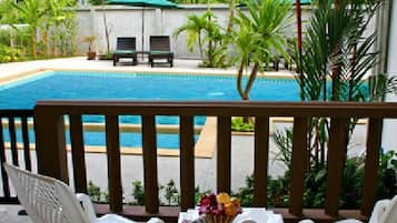 Deluxe Room (Pool Side) | In-room safe, blackout drapes, free WiFi
