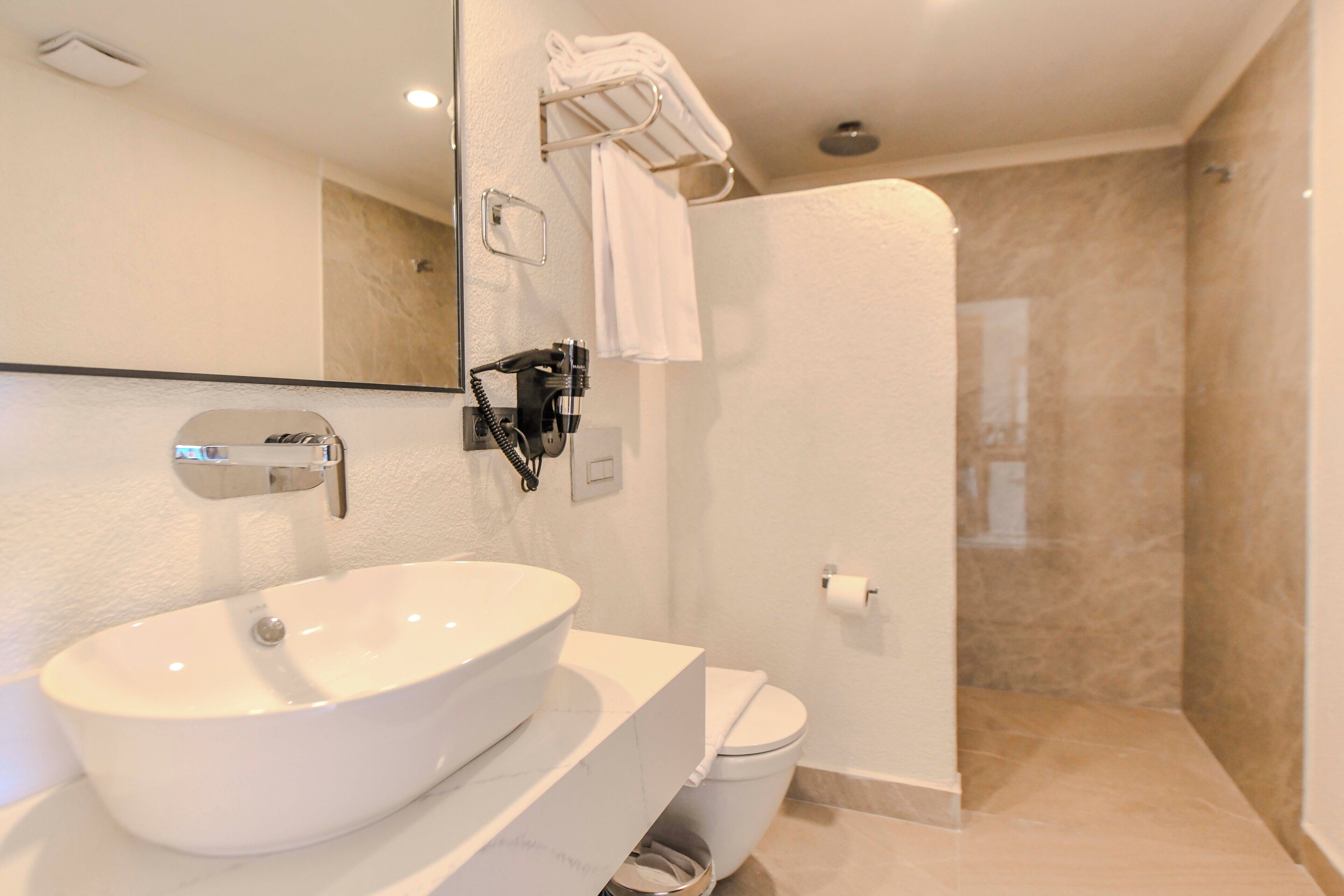 shower, free toiletries, hair dryer, bathrobes