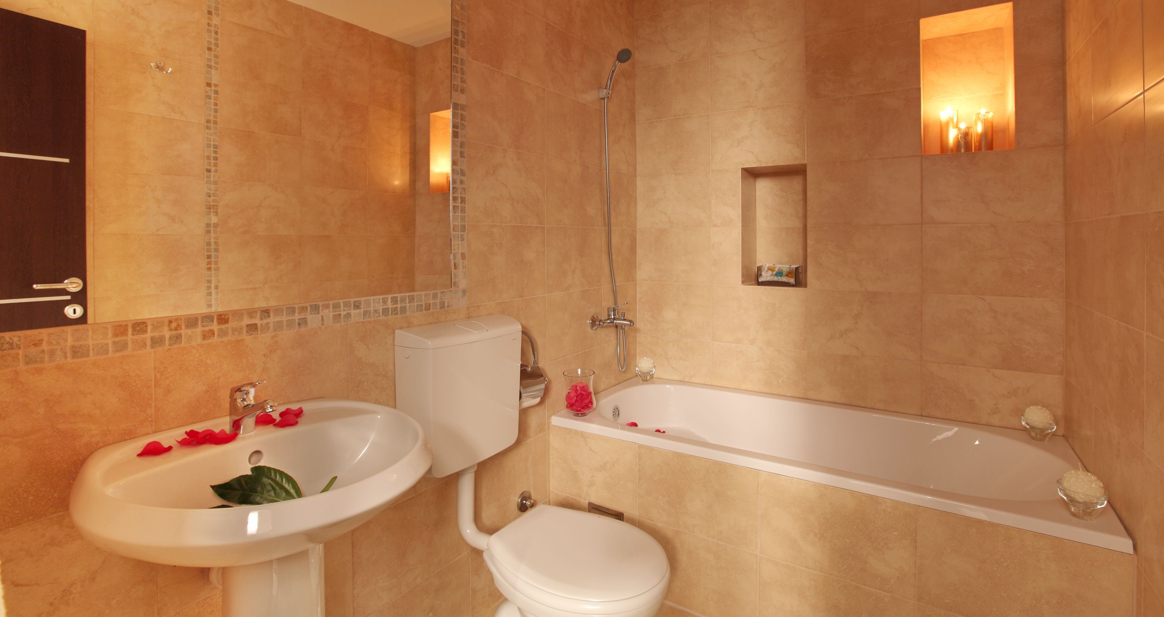 comfort room | bathroom | combined shower/bathtub, free toiletries, hair dryer, slippers