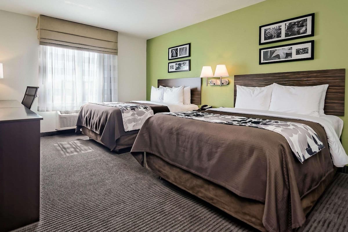 Pillowtop beds, desk, blackout drapes, iron/ironing board