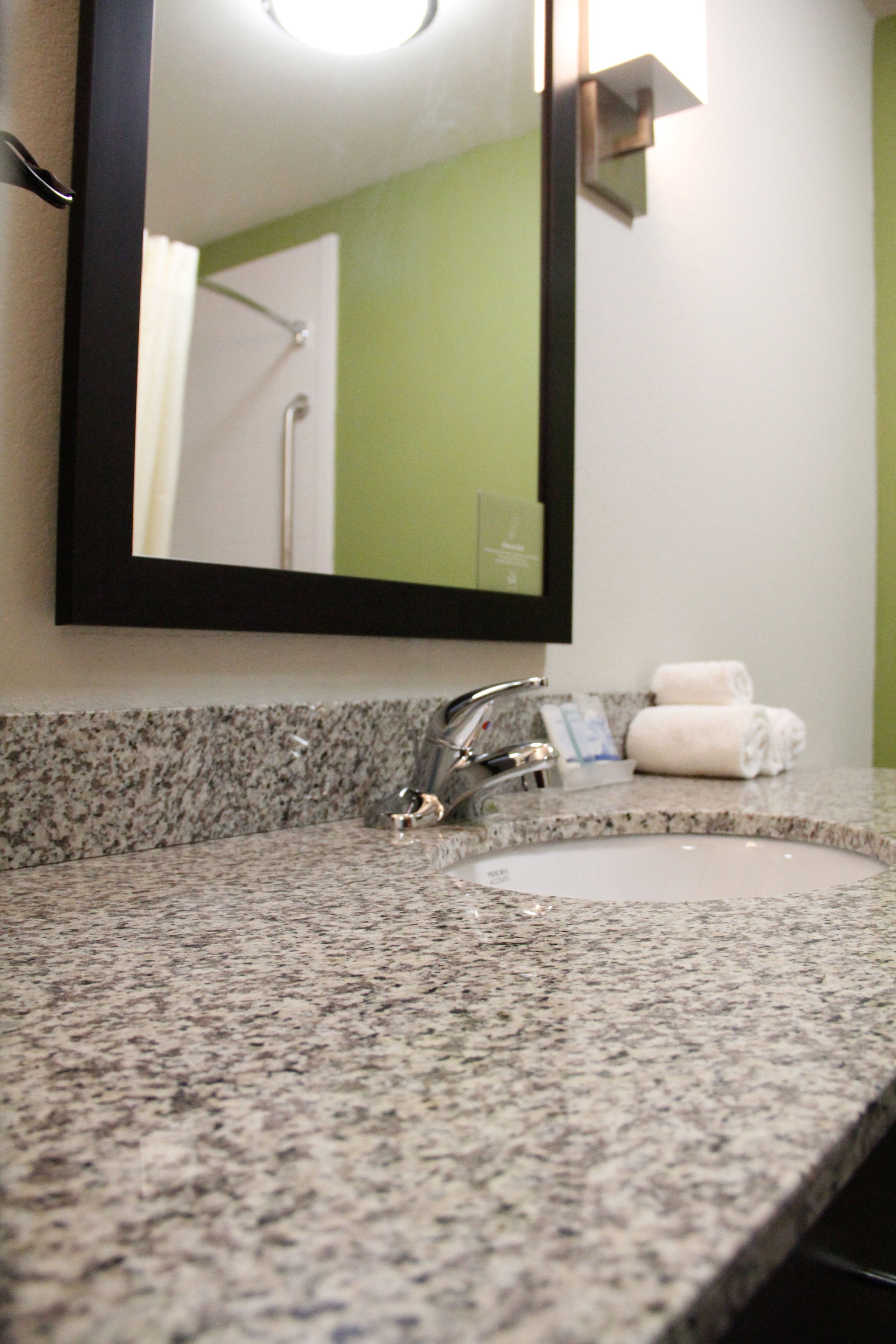 suite, 1 king bed with sofa bed, non smoking | bathroom | free toiletries, hair dryer, towels, soap