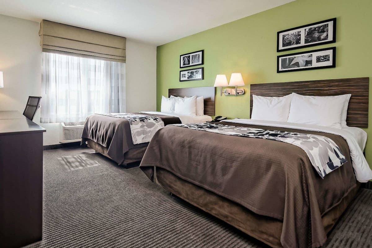 Pillowtop beds, desk, blackout drapes, iron/ironing board