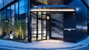 The exterior of the Millennium Mitsui Garden Hotel with a modern design, large glass windows, and a prominent entrance. - Millennium Mitsui Garden Hotel Tokyo/Ginza (Tokyo)
