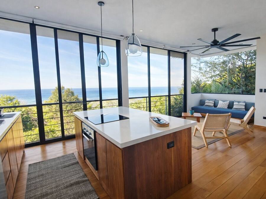 Wave Suite Apartment | Private kitchen | Stovetop, blender, coffee grinder, freezer