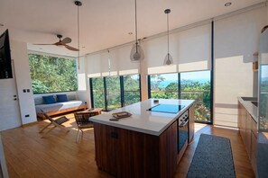 Departamento exclusivo, vista al océano | Área de sala de estar