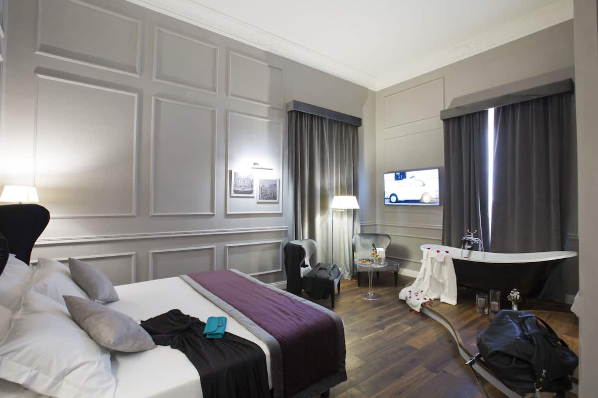 Premium bedding, memory-foam beds, free minibar, in-room safe