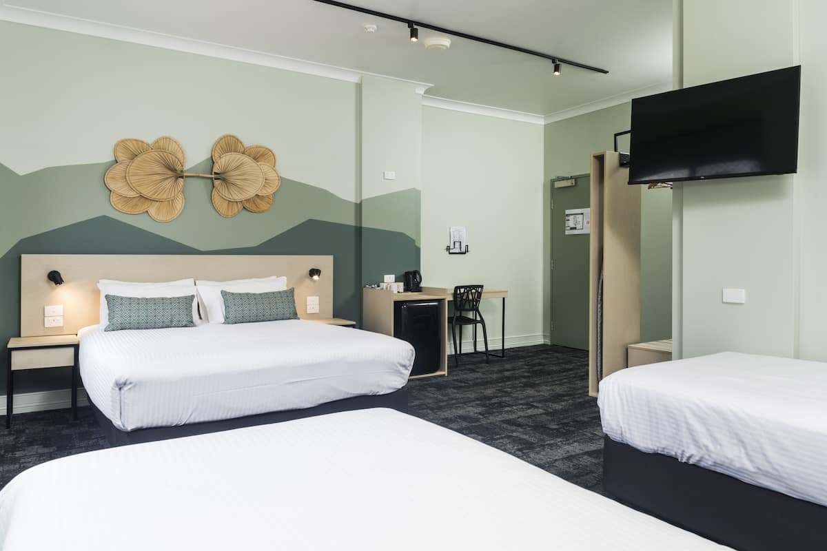 Familie studio (Standard) | Een bureau, een strijkplank/strijkijzer, gratis wifi, beddengoed