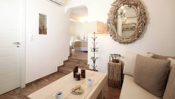 Suite, Sea View | Living area | LCD TV