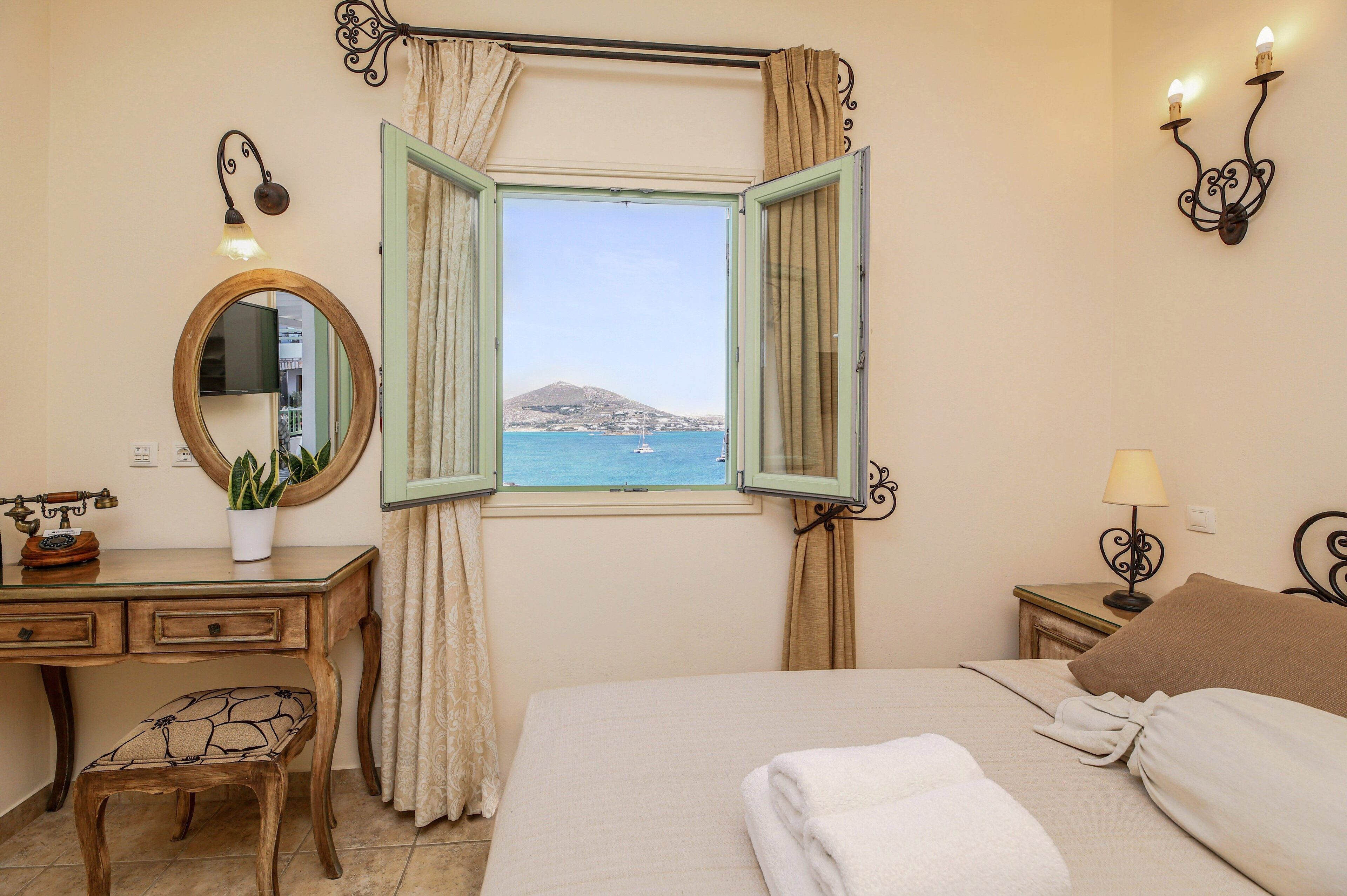 Family Suite, 2 Bedrooms, Sea View | In-room safe, desk, soundproofing, iron/ironing board