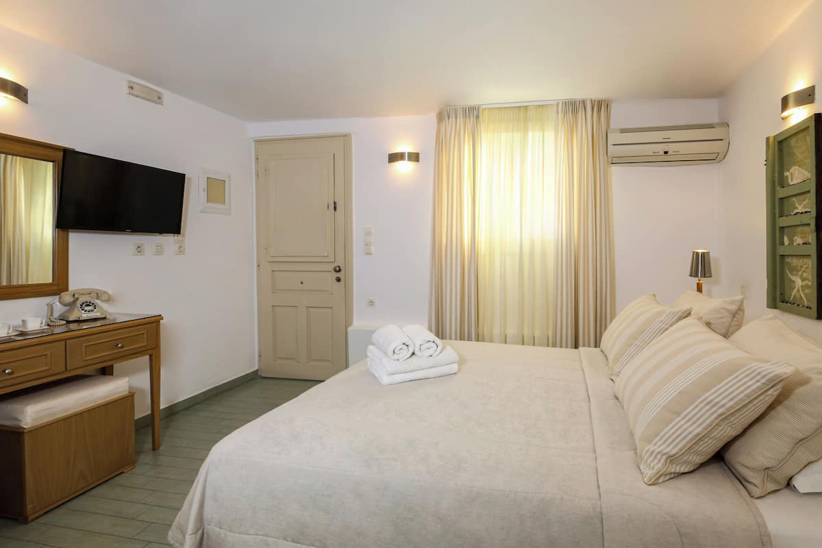 Economy Studio, Courtyard View | In-room safe, desk, soundproofing, iron/ironing board (on request)