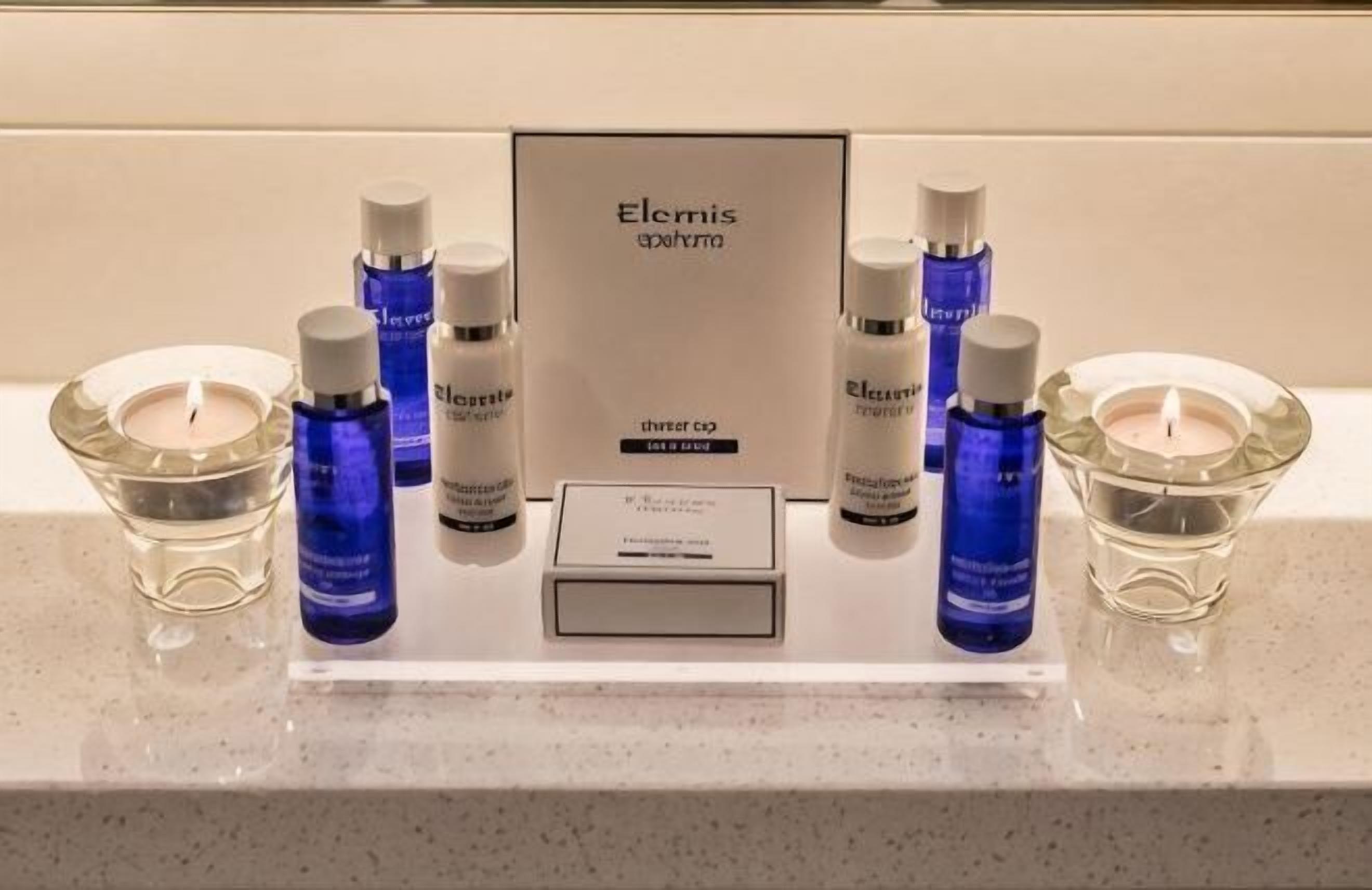 Bathroom amenities | Designer toiletries, hair dryer, towels, shampoo