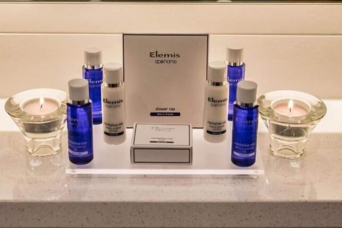 Designer toiletries, hair dryer, towels, shampoo