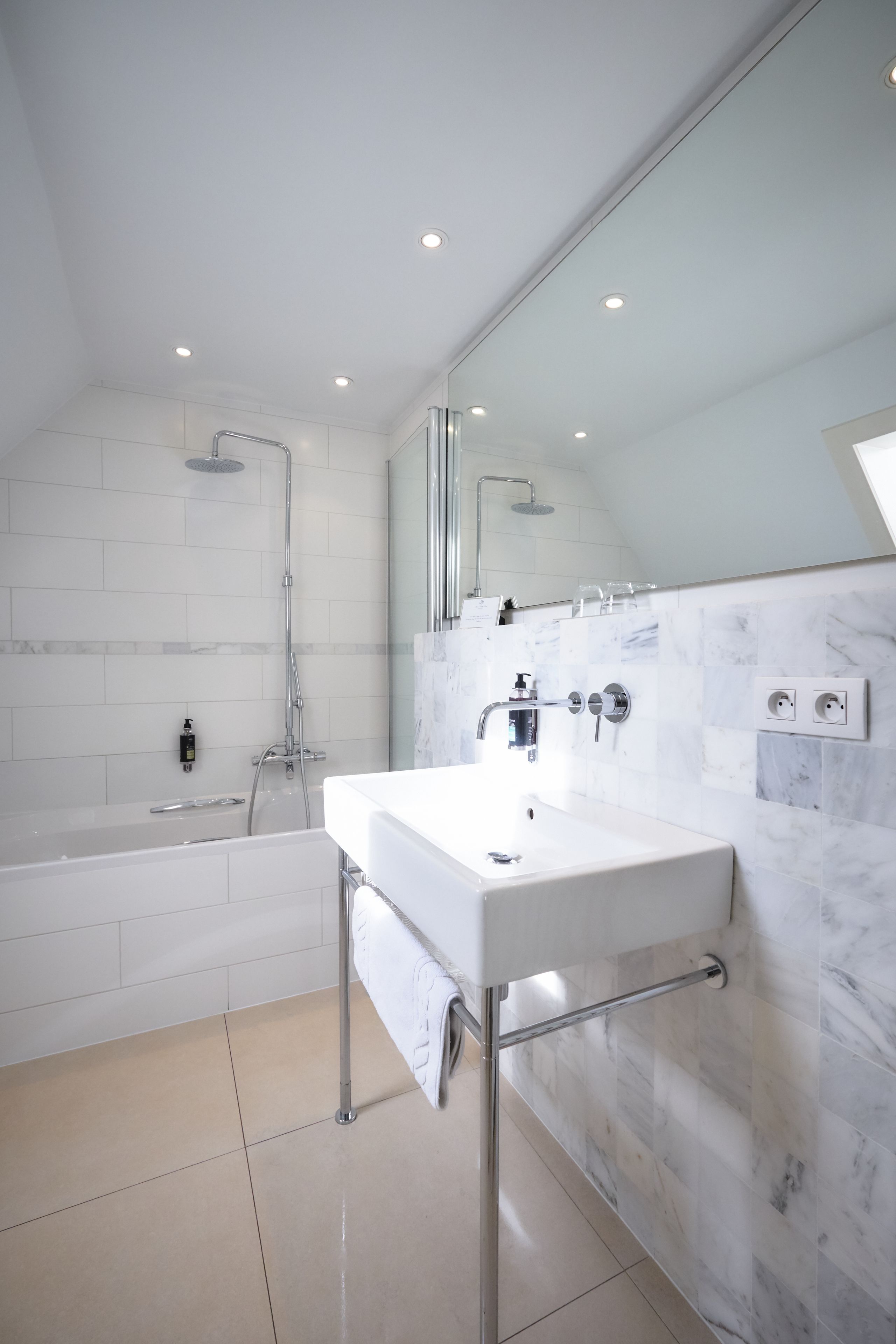 loft | bathroom | hair dryer, slippers, towels