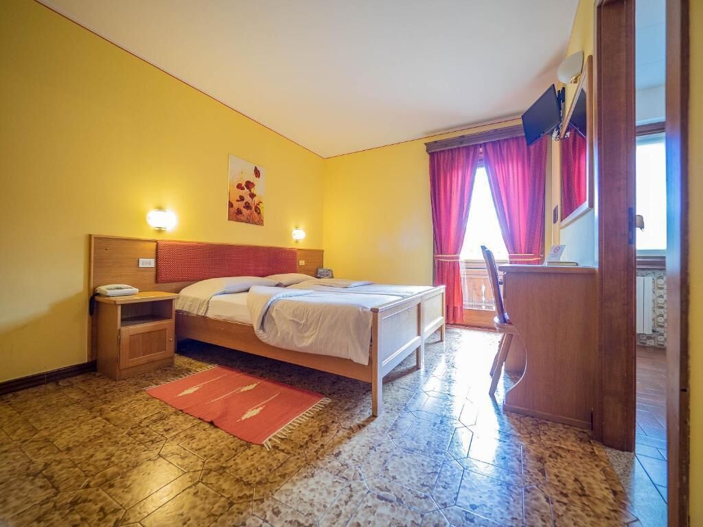 desk, cots/infant beds, free wifi, bed sheets