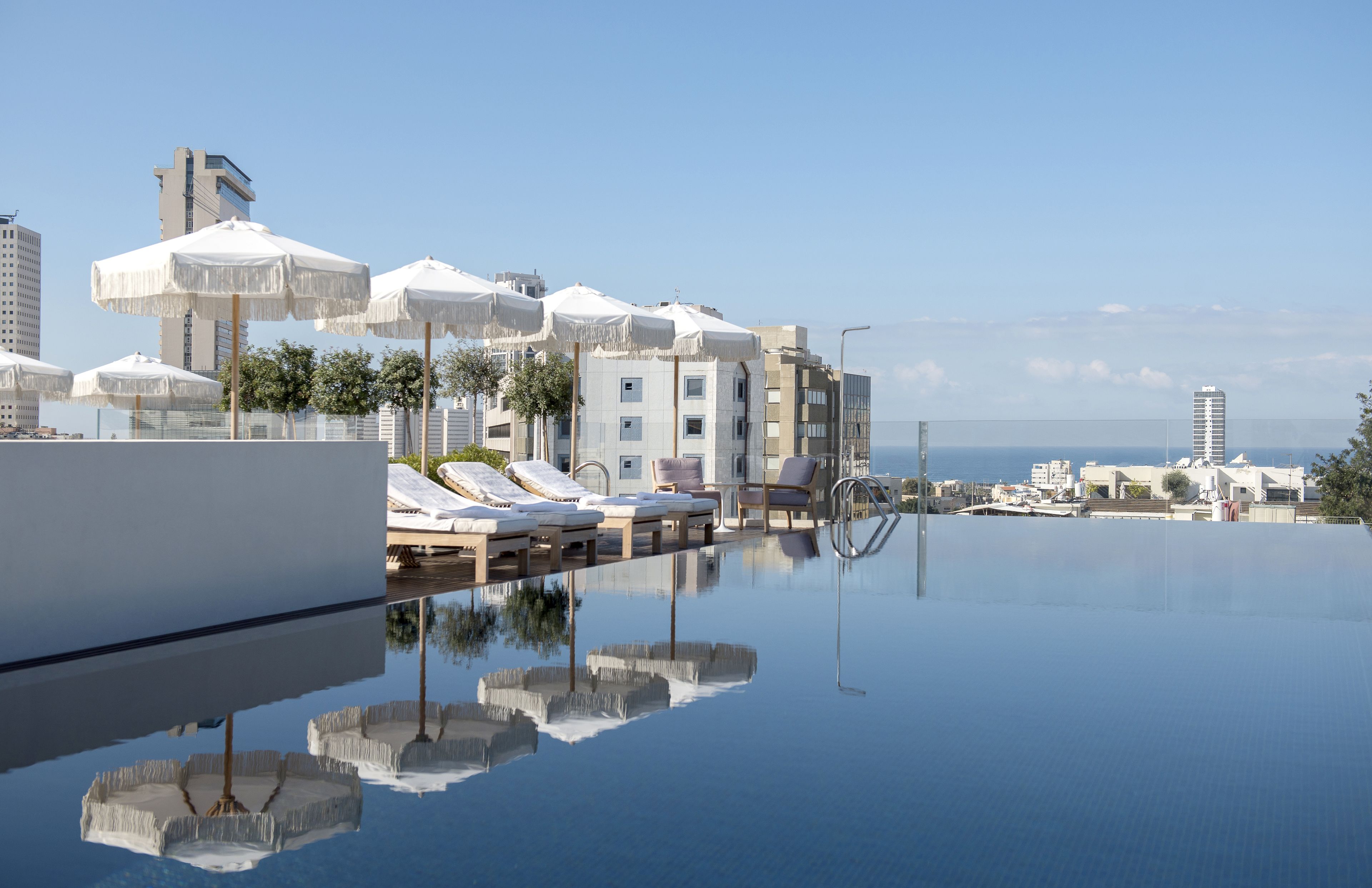 seasonal outdoor pool, pool umbrellas