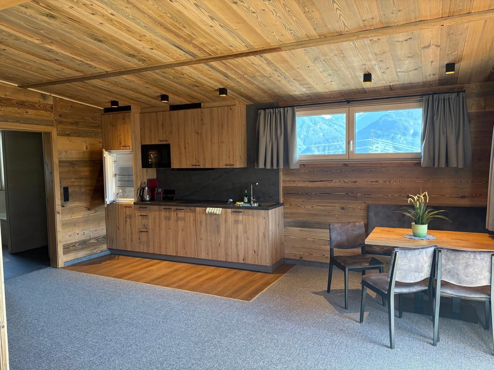 Alpenpenthouse Suite | Private kitchen | Full-sized fridge, microwave, stovetop, dishwasher