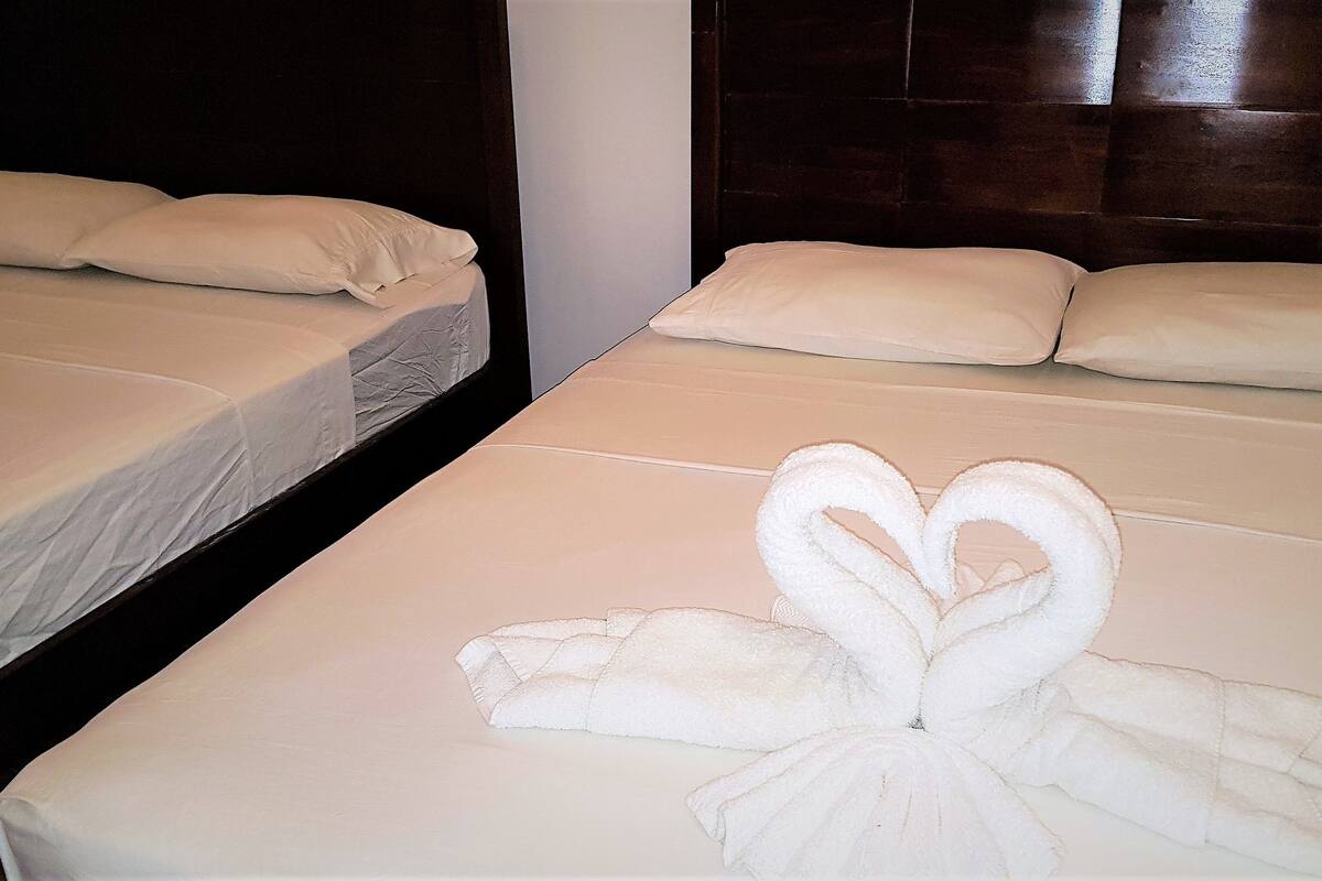 basic room, 2 queen beds | 1 bedroom, in-room safe, free wifi, bed sheets