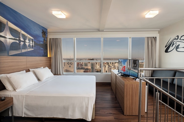 Duplex | Minibar, in-room safe, desk, blackout drapes