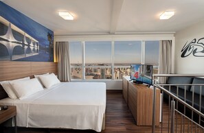 Duplex | Minibar, in-room safe, individually decorated, desk