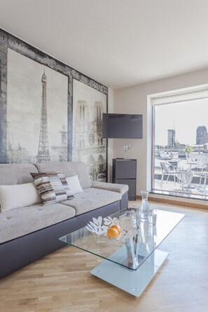 Apartment, 1 Bedroom | Living room | Flat-screen TV