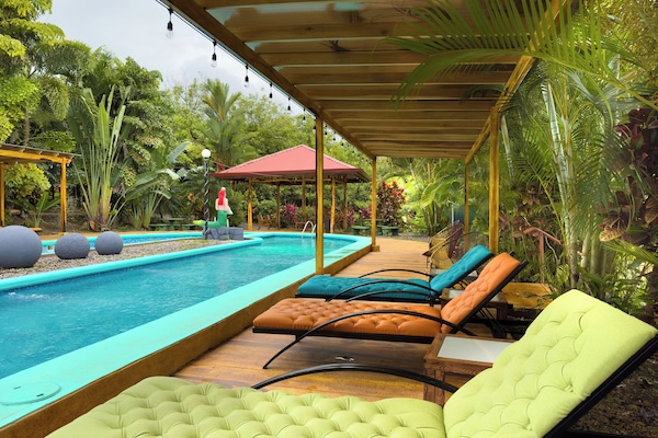 2 outdoor pools, open 9:00 AM to 9:00 PM, pool loungers