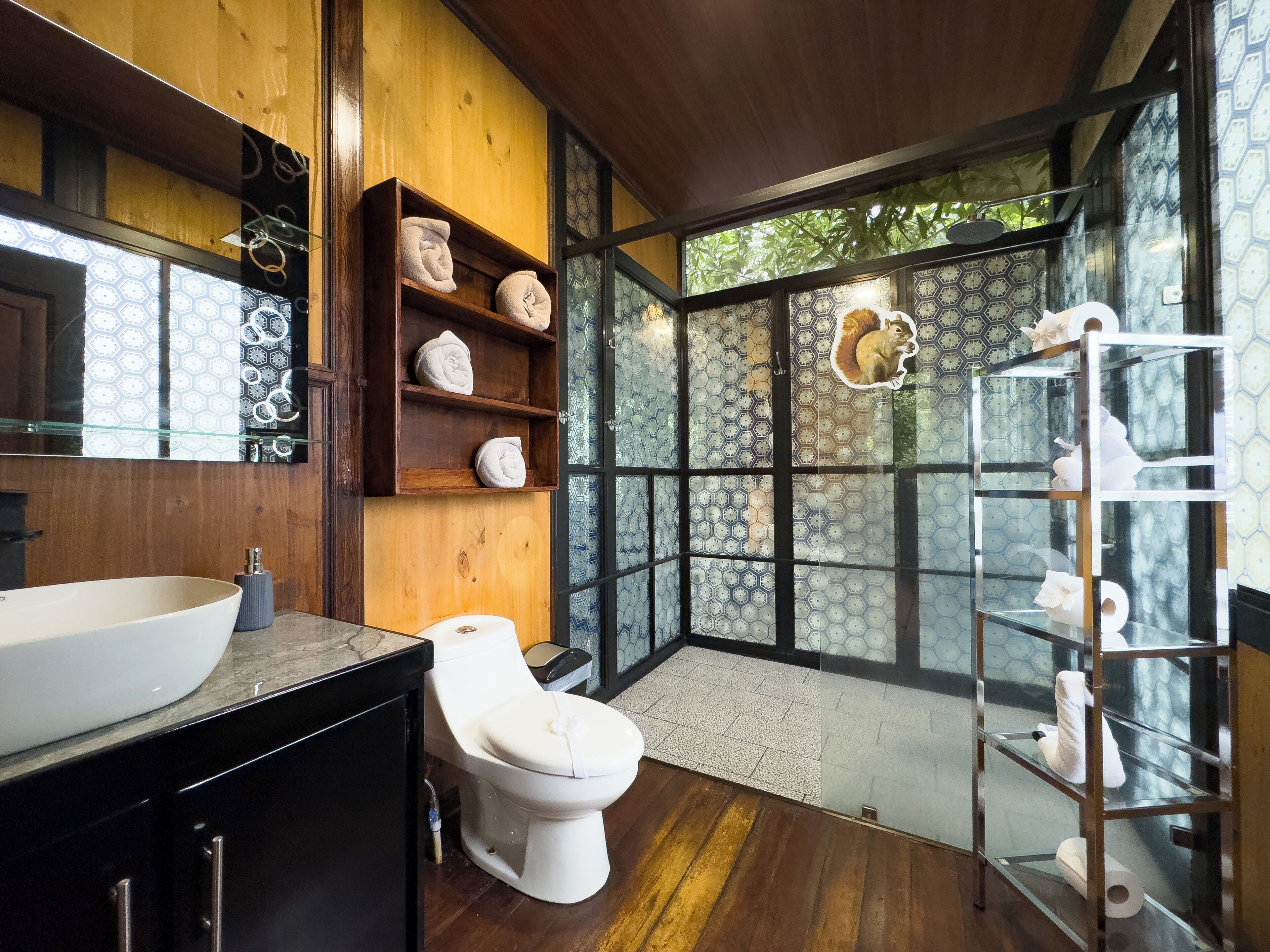 deluxe bungalow | bathroom | bathtub, free toiletries, hair dryer, towels