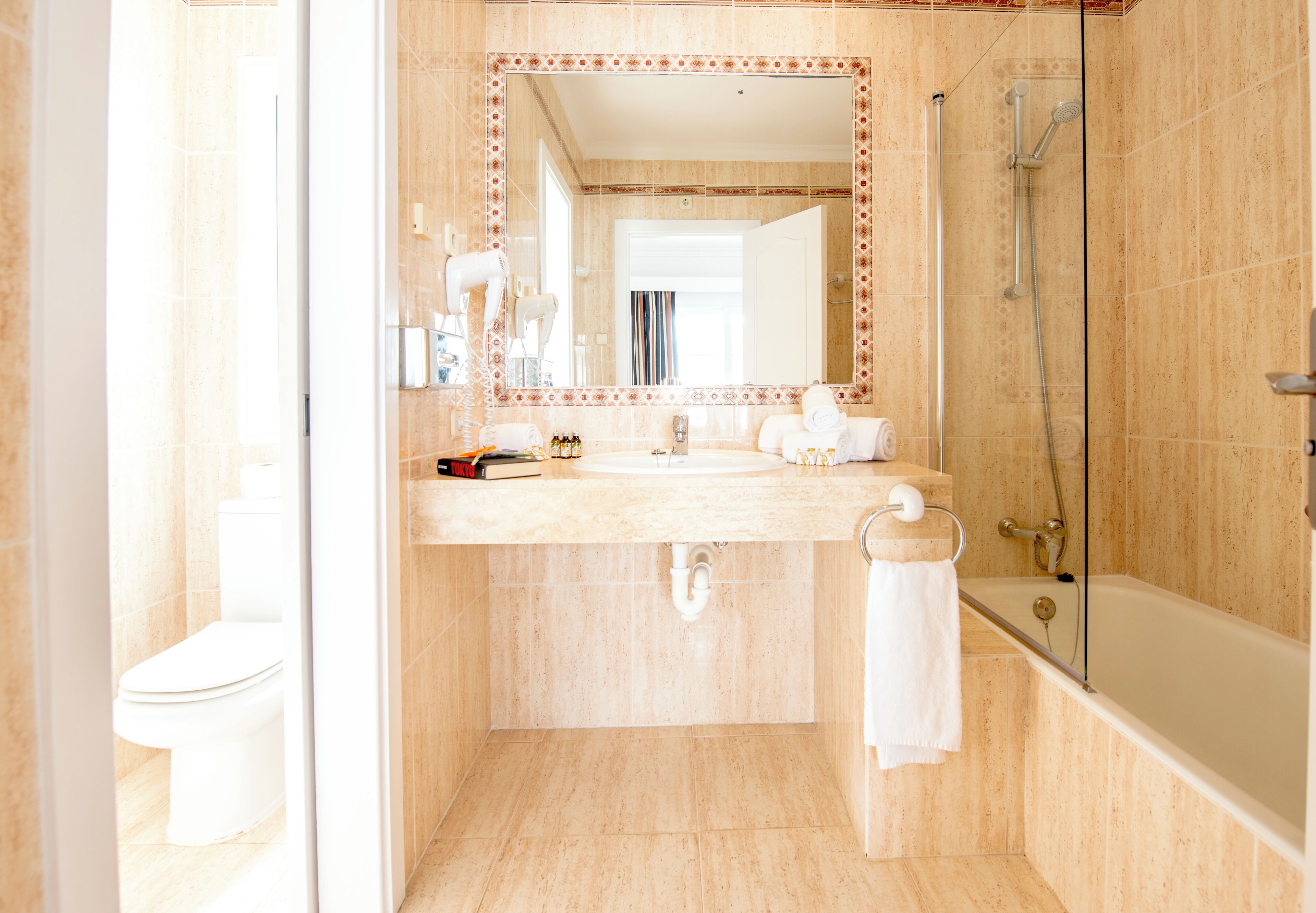 shower, designer toiletries, hair dryer, bidet