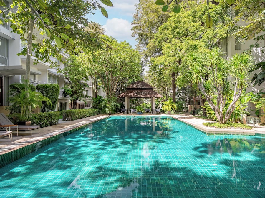 Outdoor pool, open 7:00 AM to 7:00 PM, pool umbrellas, pool loungers