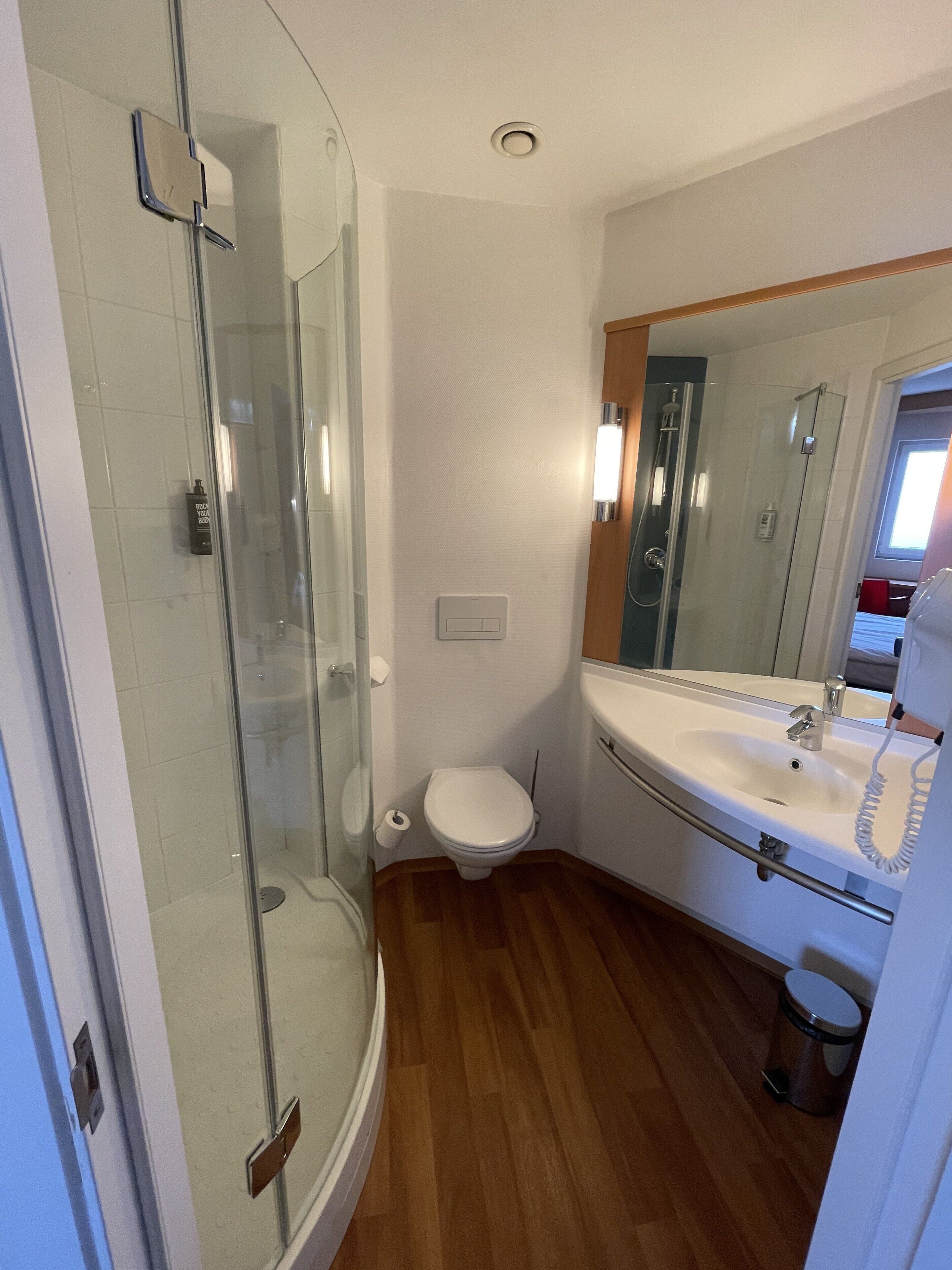 shower, eco-friendly toiletries, hair dryer, towels