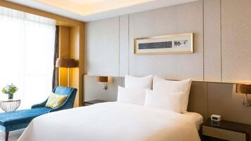 Executive Suite, 1 King Bed | Premium bedding, minibar, in-room safe, blackout drapes