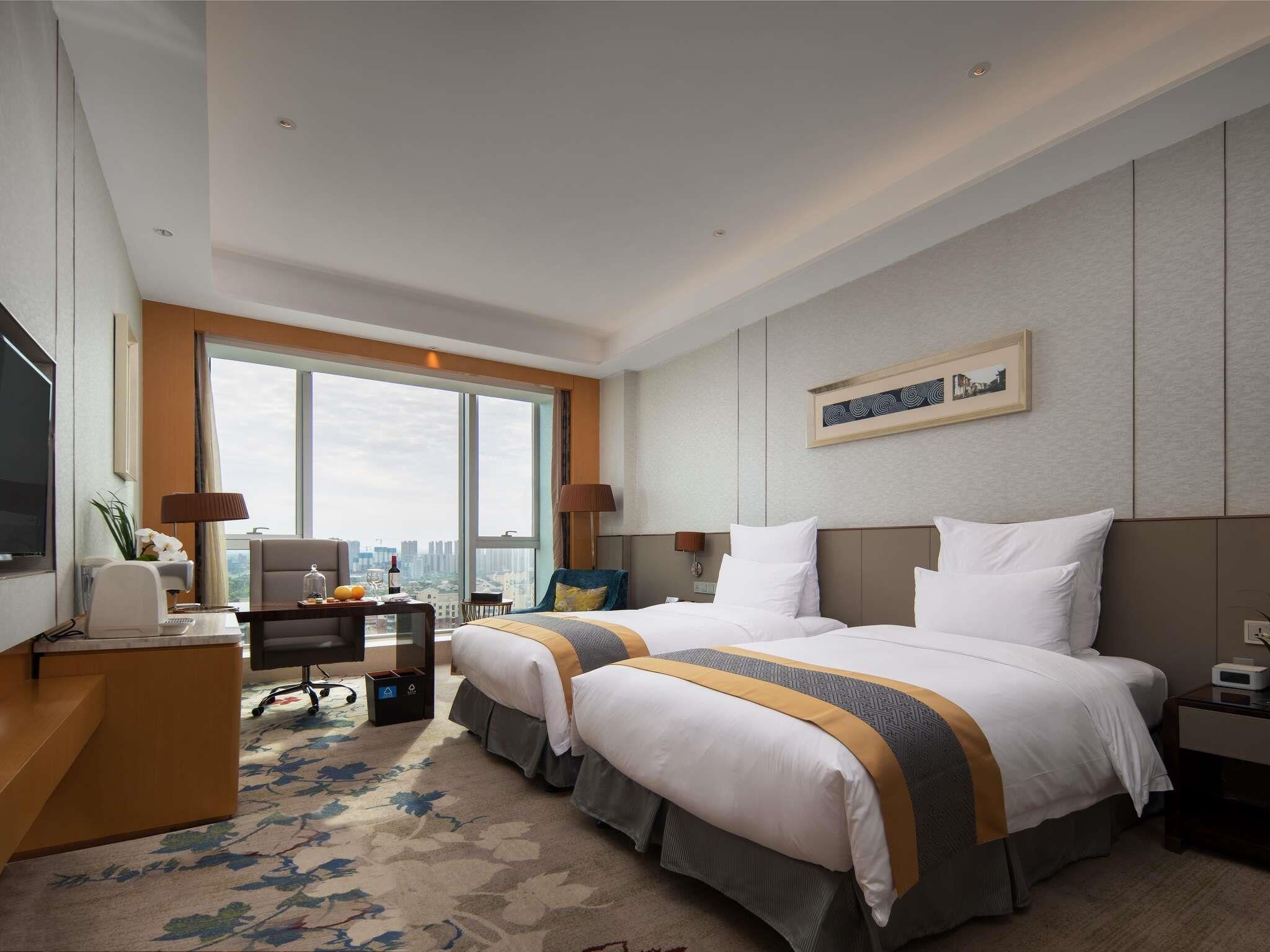 Habitación ejecutiva, 2 camas individuales | Ropa de cama de alta calidad y minibar 