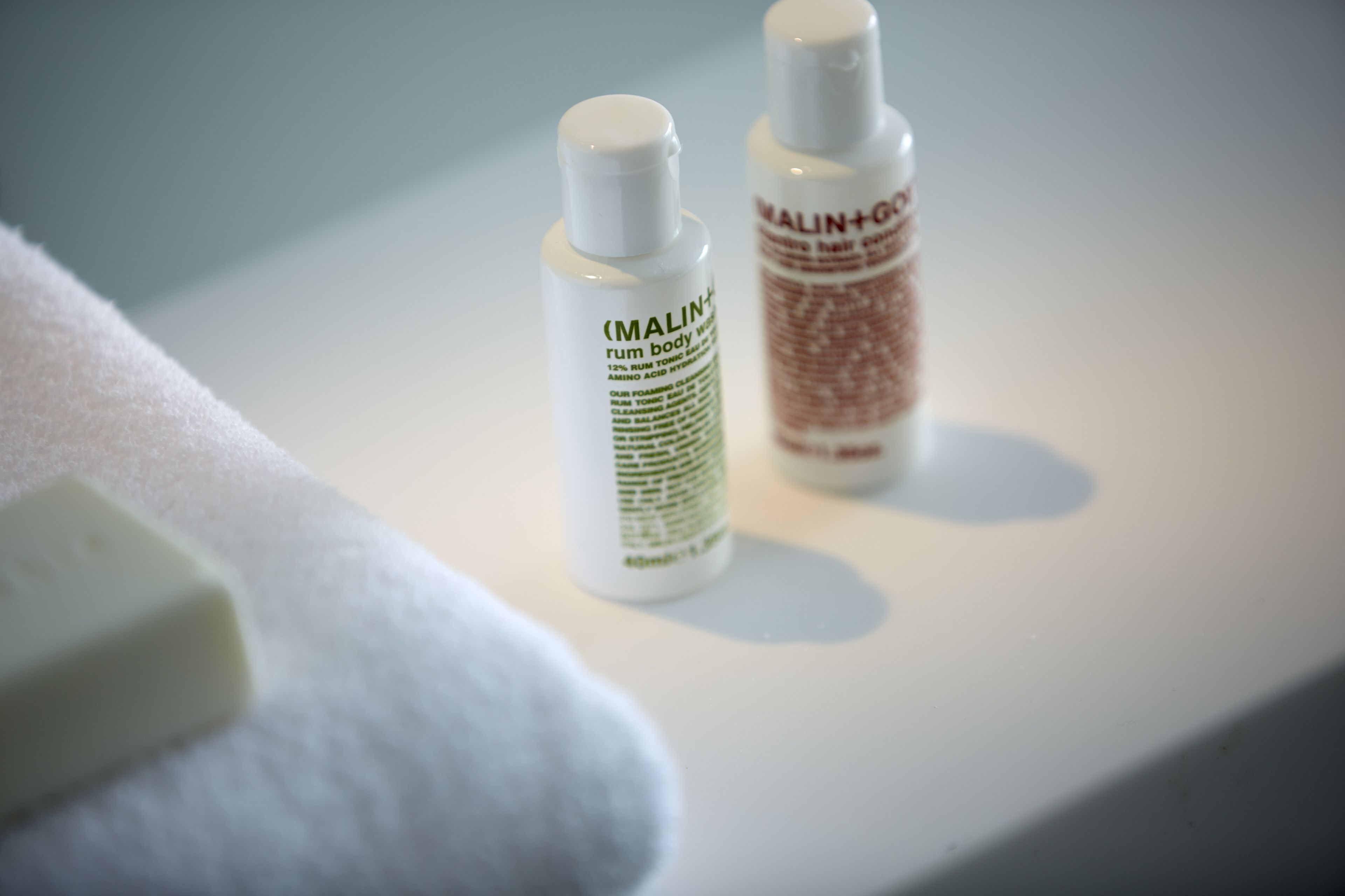eco-friendly toiletries, slippers, towels