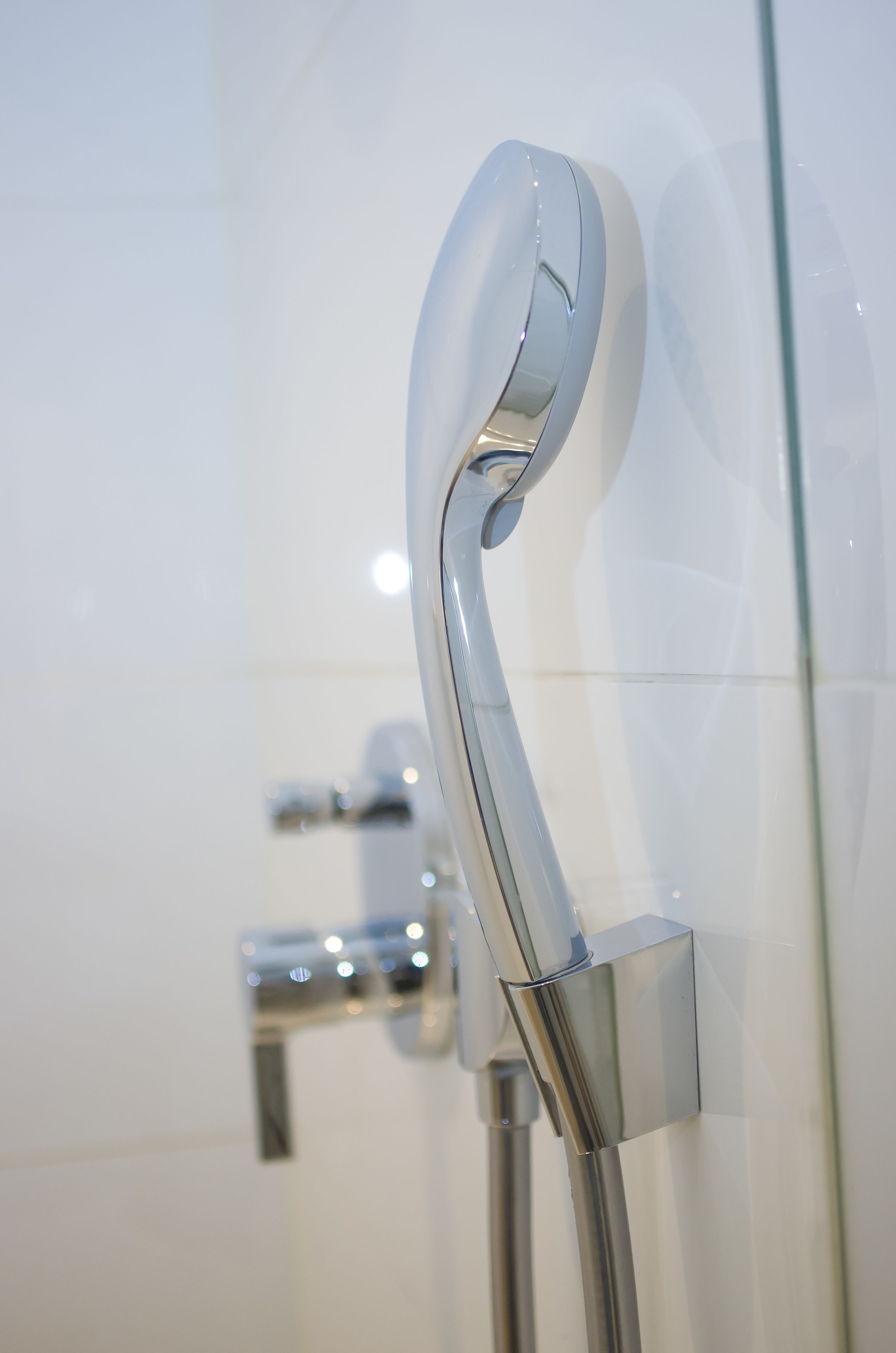 rainfall showerhead, eco-friendly toiletries, hair dryer, towels