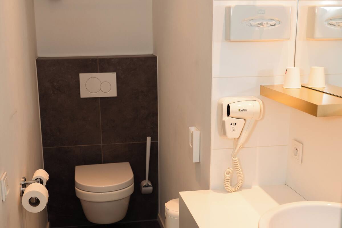 room (single room) | bathroom | rainfall showerhead, eco-friendly toiletries, hair dryer, towels