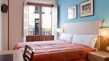 Premium bedding, down comforters, in-room safe, desk