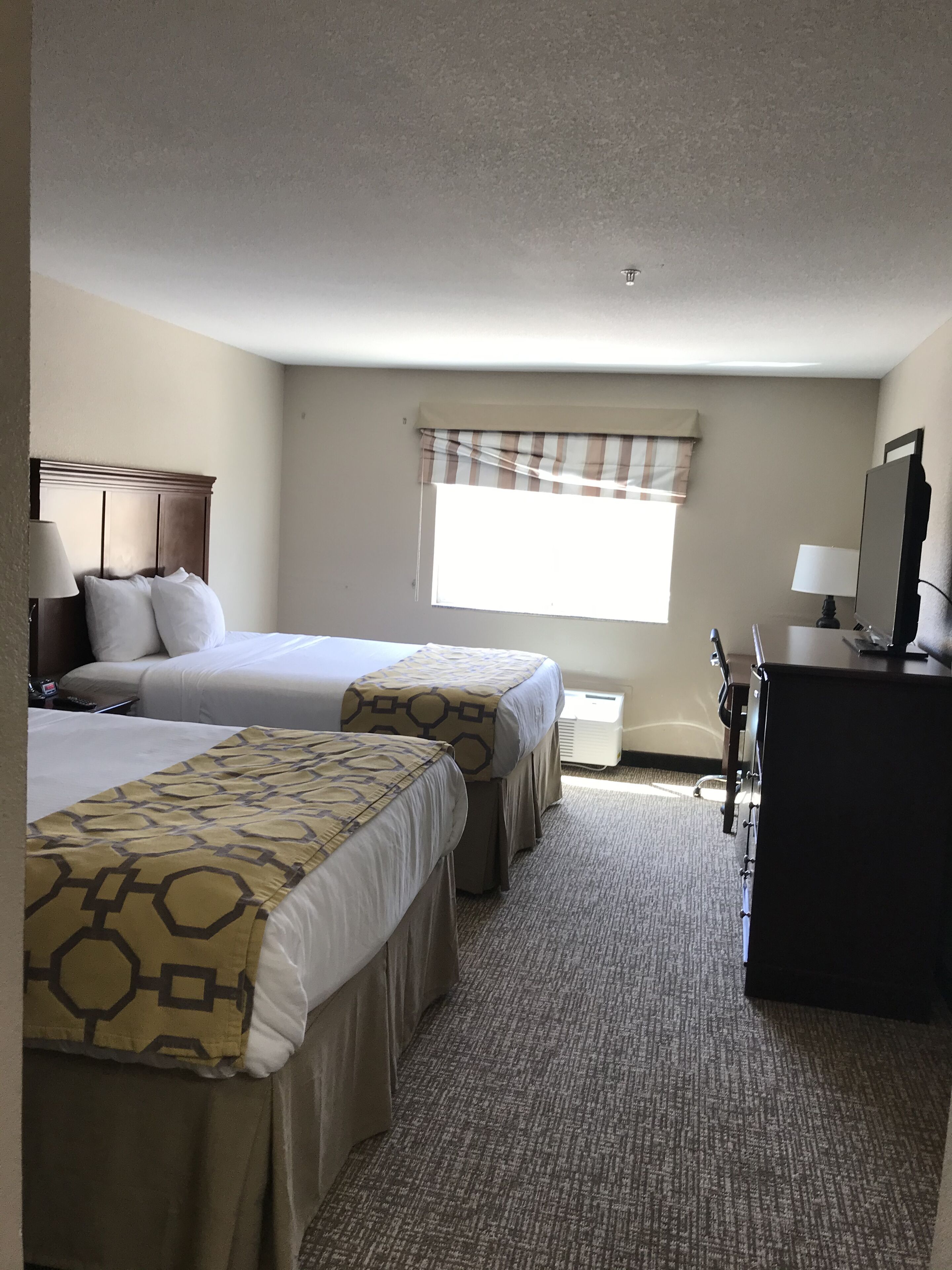 pillow-top beds, desk, laptop workspace, iron/ironing board