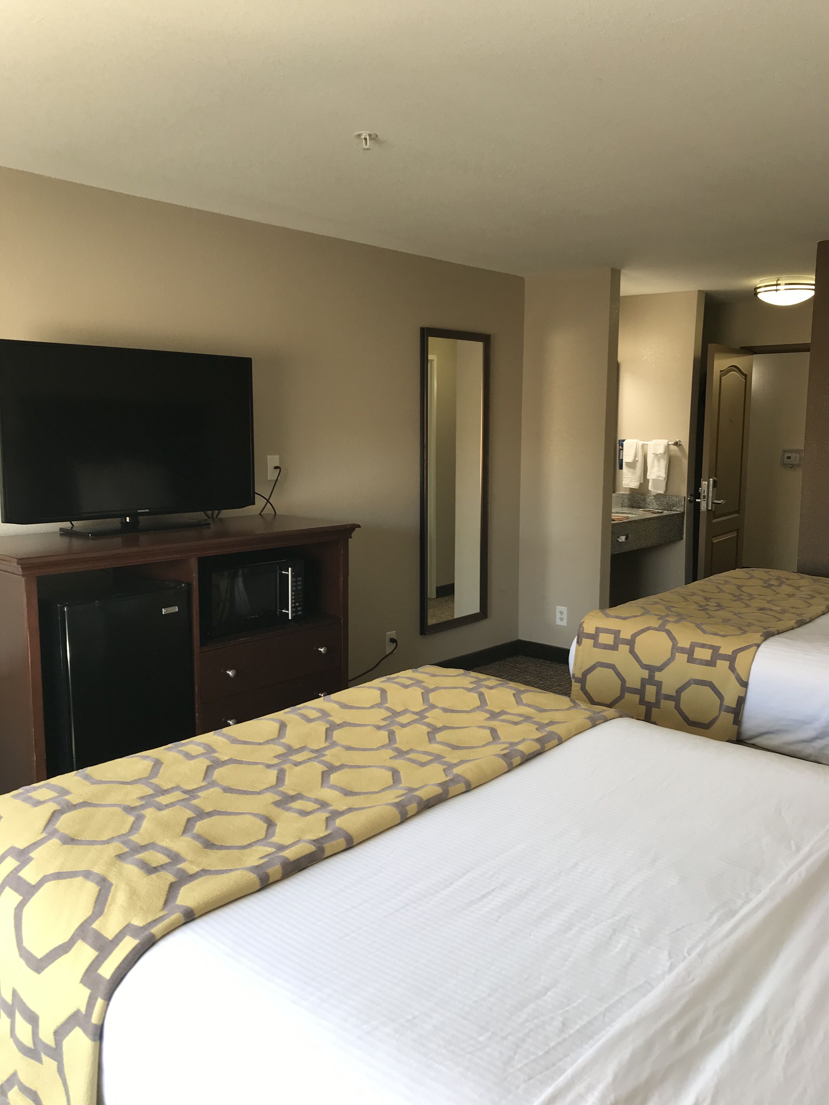 pillow-top beds, desk, laptop workspace, iron/ironing board