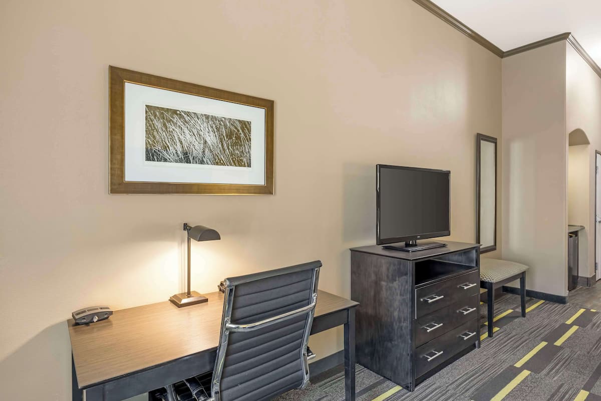 Desk, laptop workspace, iron/ironing board, cots/infant beds