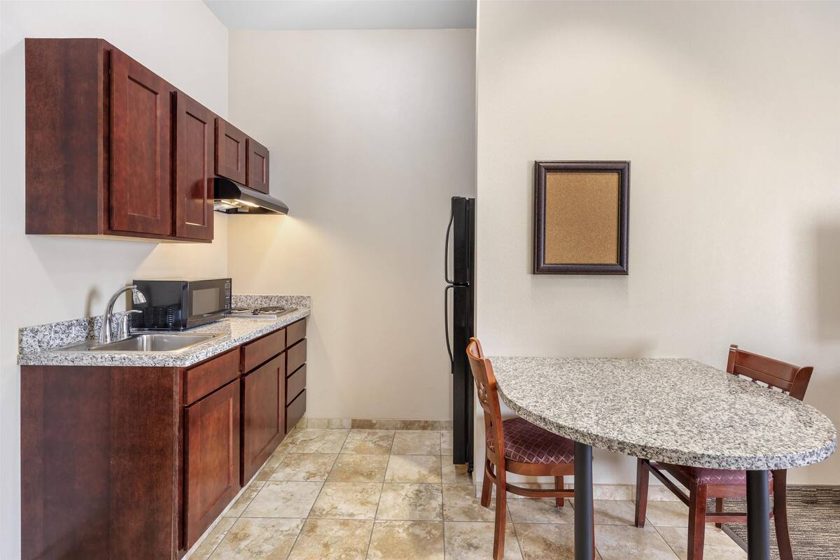 standard room, 2 queen beds, accessible, kitchenette | desk, laptop workspace, blackout curtains, iron/ironing board