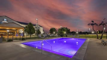 Seasonal outdoor pool, open 6:00 AM to 10:30 PM, pool loungers