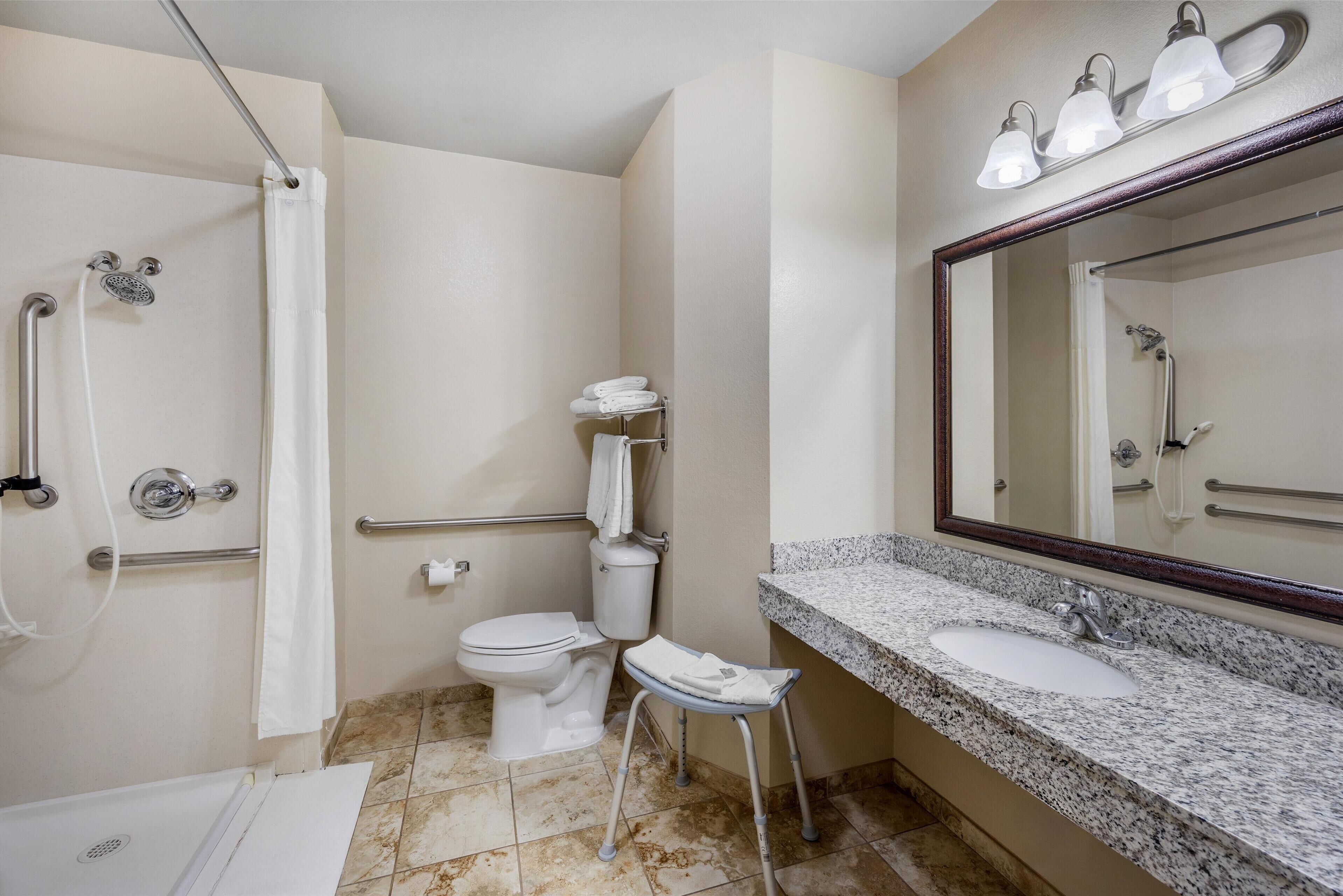 standard room, 2 queen beds, accessible, kitchenette | bathroom | combined shower/bathtub, free toiletries, hair dryer, towels
