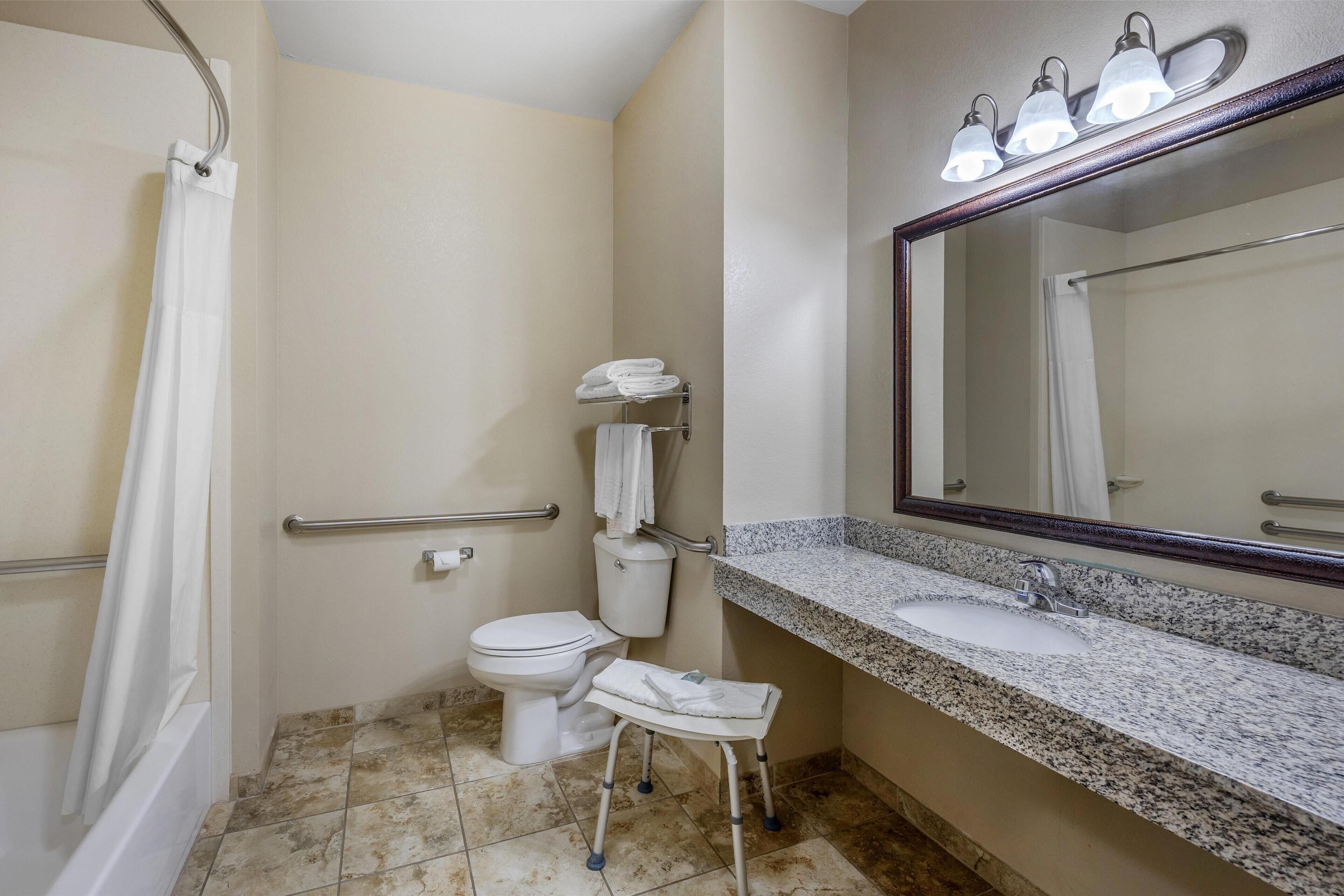 standard room, 2 queen beds, accessible, kitchenette | bathroom | combined shower/bathtub, free toiletries, hair dryer, towels