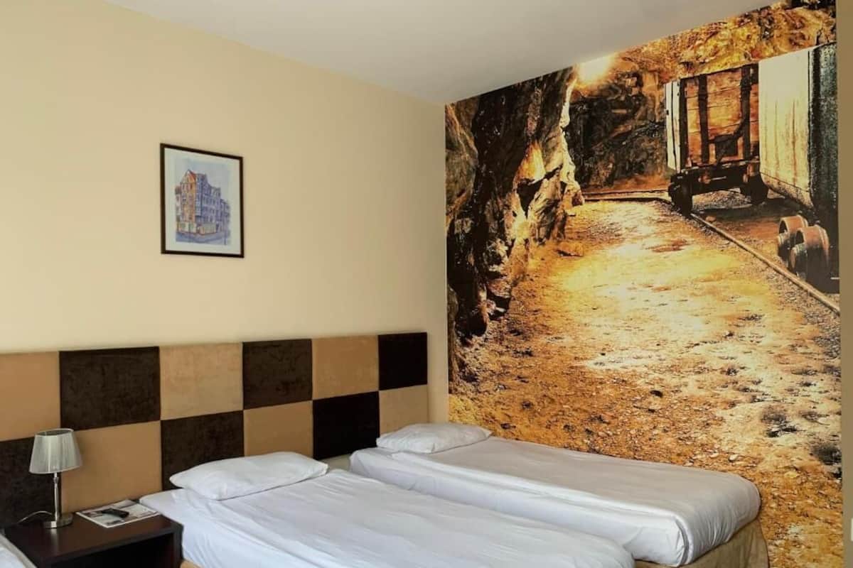 Standard Triple Room | Desk, blackout drapes, iron/ironing board, free WiFi